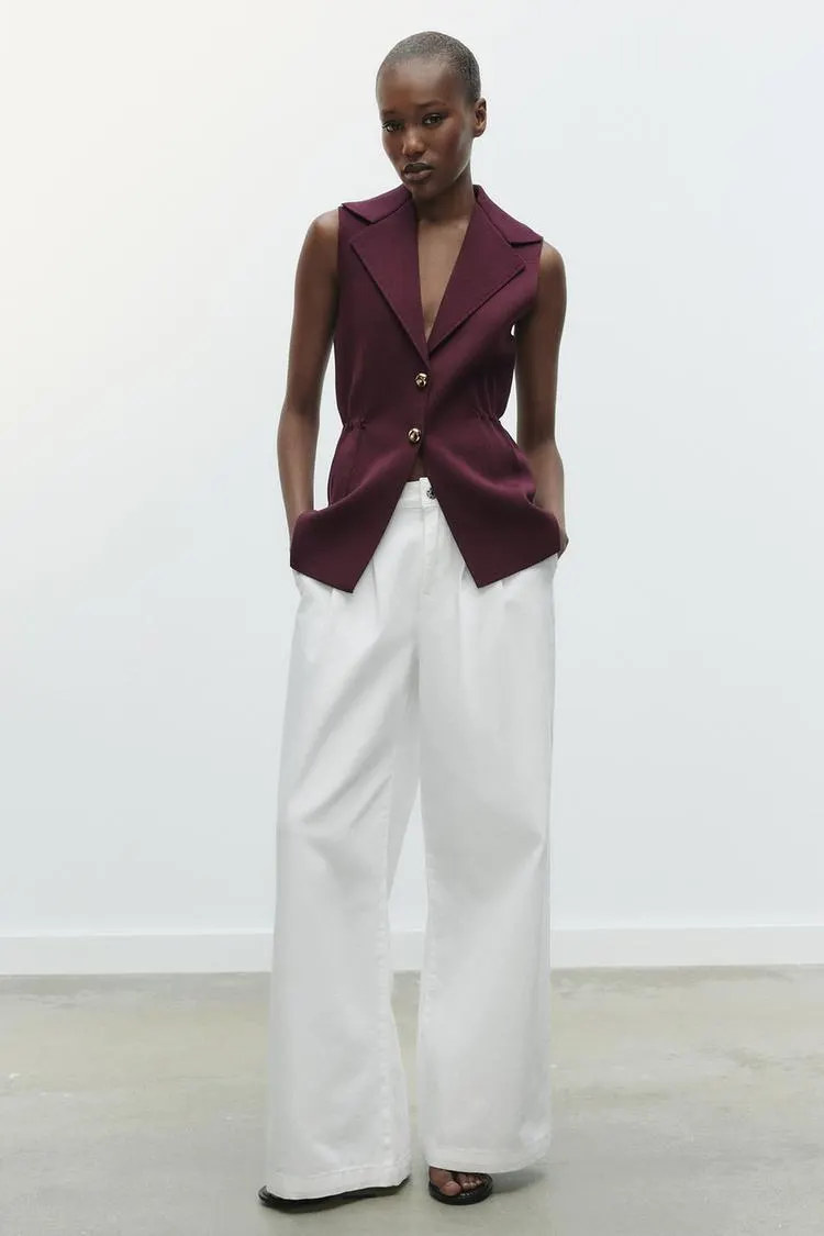 RUFFLED WAIST VEST TOP