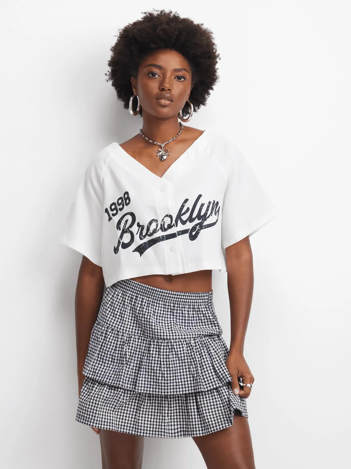 The FIX Women's White Shaakira Cropped Baseball Top With Print