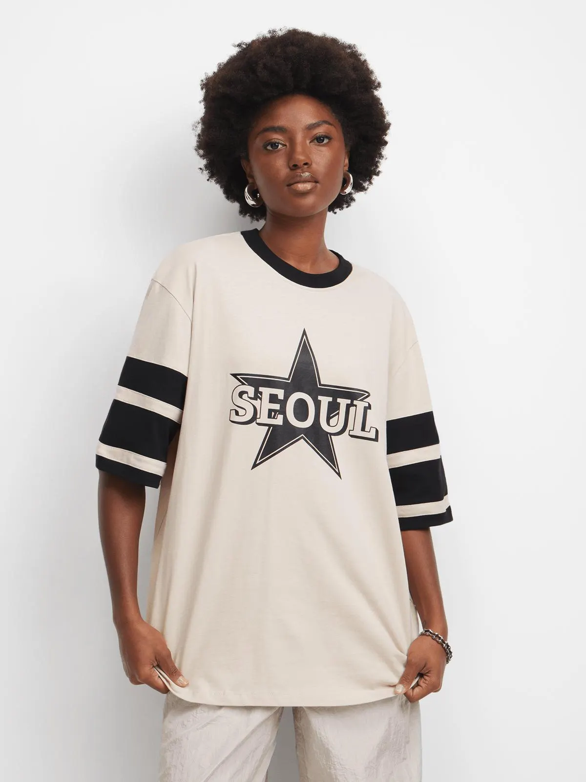 The FIX Women's Stone Seoul Oversized Graphic Top
