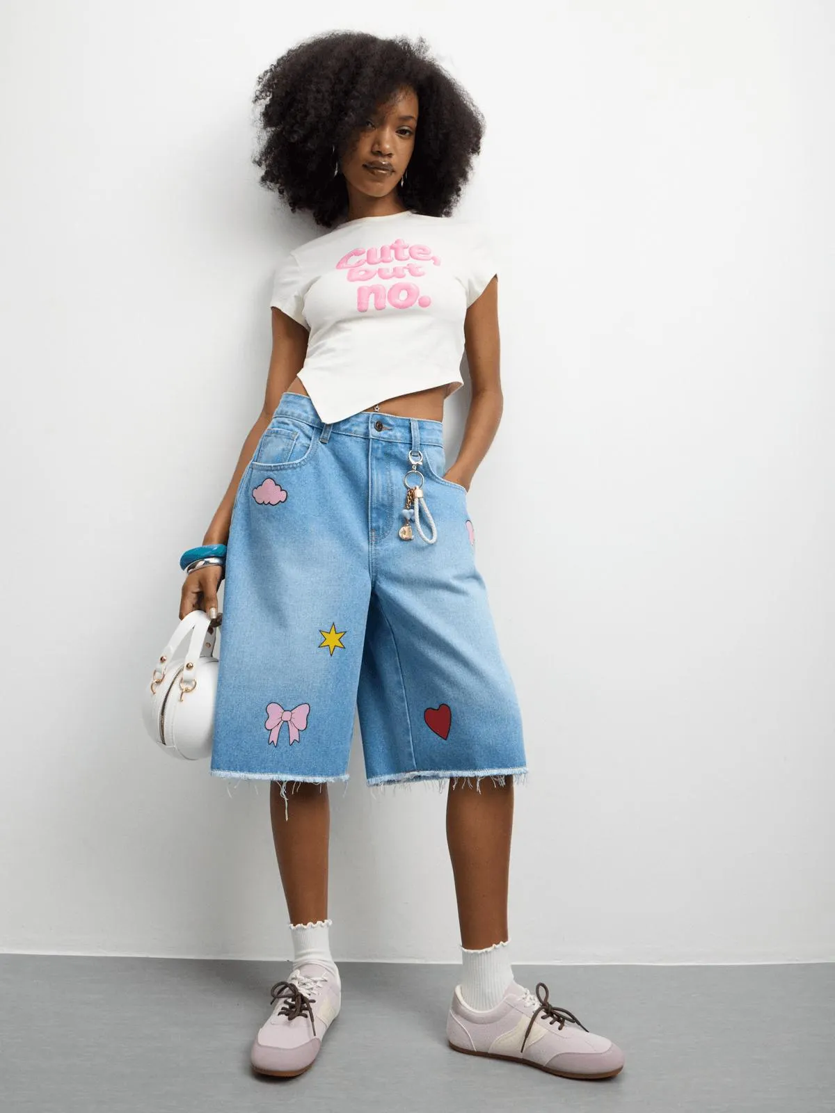 The FIX Women's Mid-Wash Cloud Print Denim Shorts