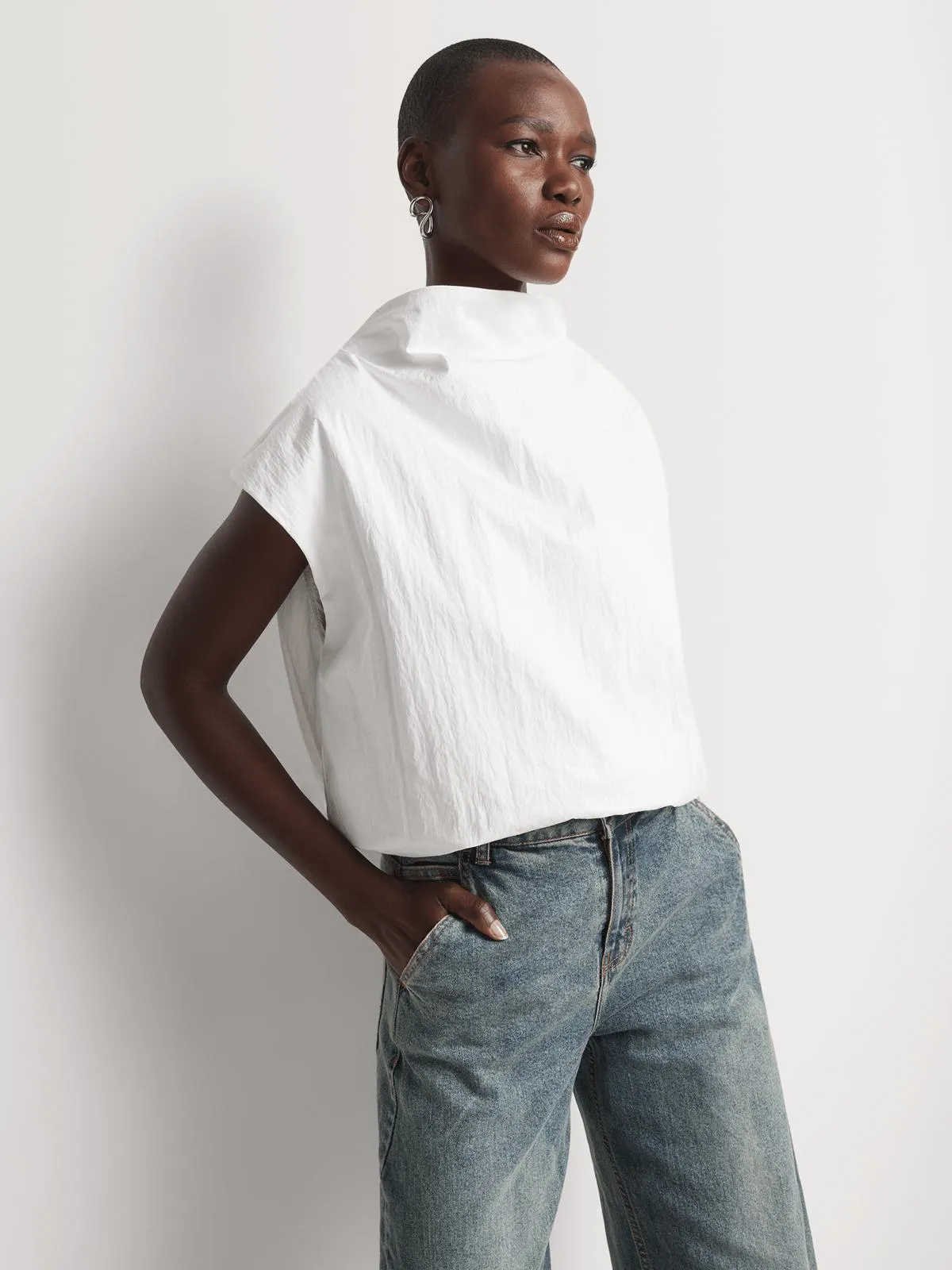 Highneck Extended Shoulder Bubble Hem Top