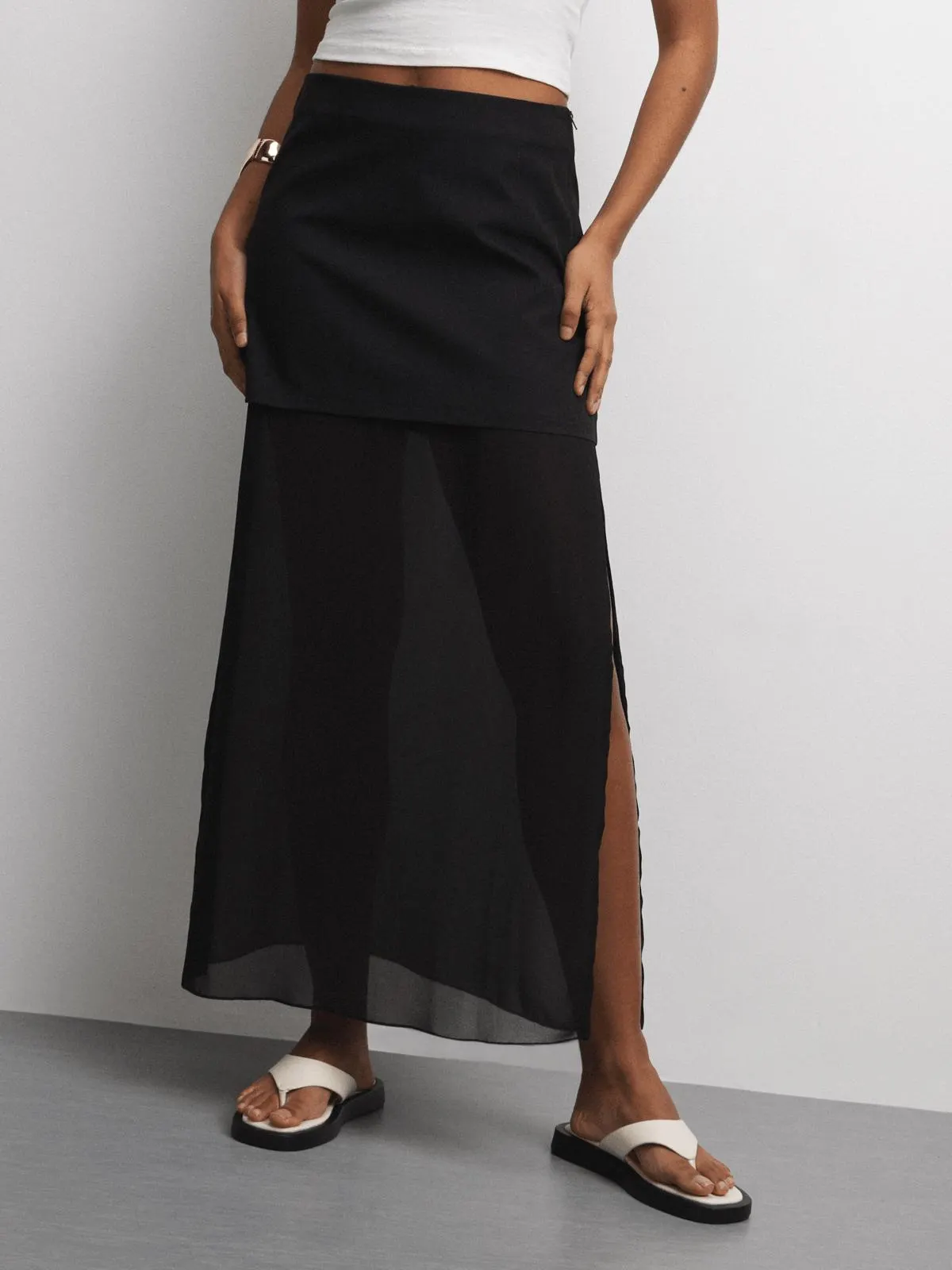 The FIX Women's Black Faux Mini Skirt With Chiffon Overlay