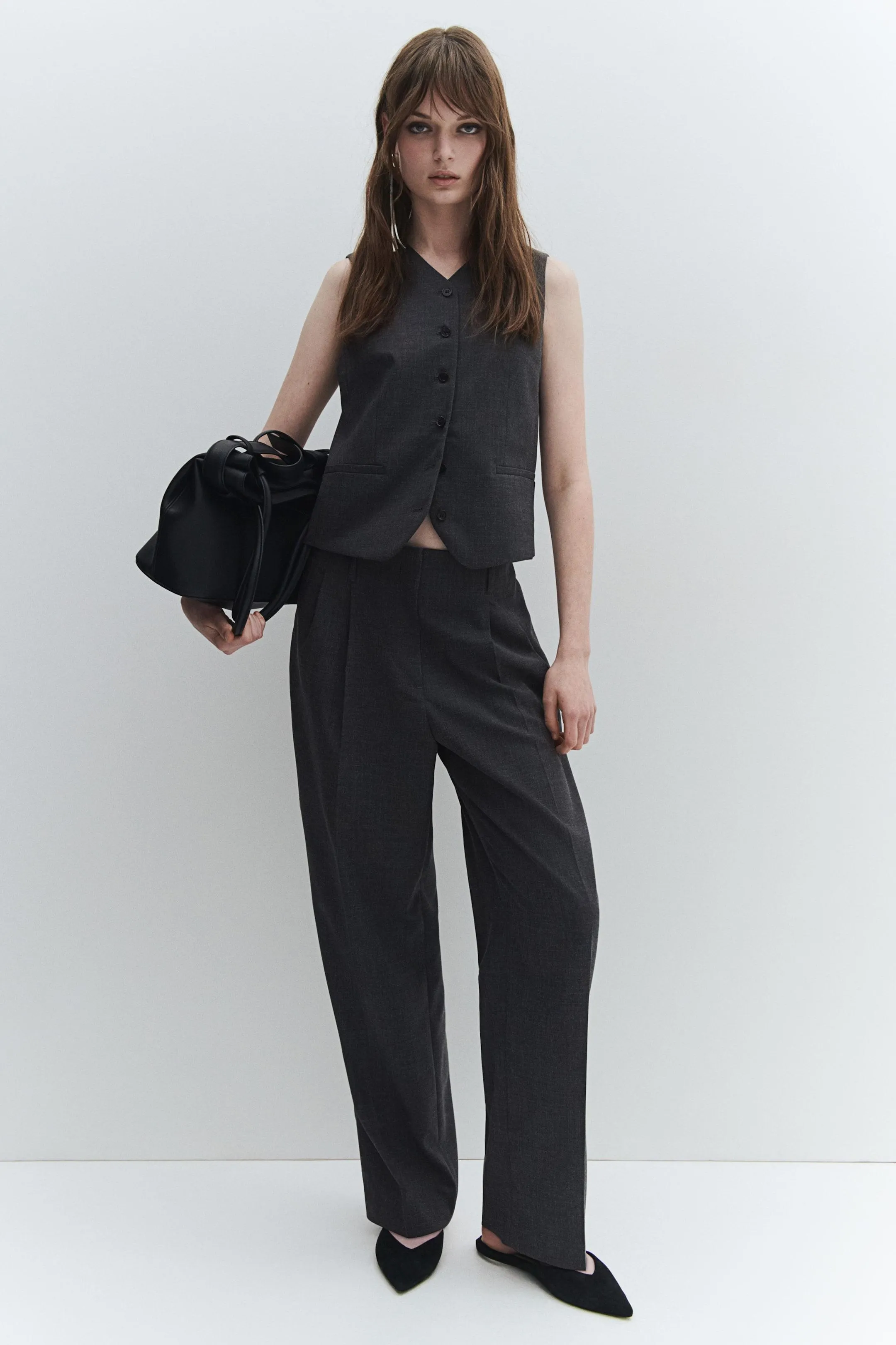 Pantaloni conici